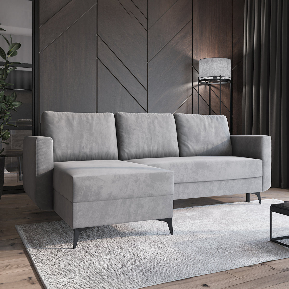 Forra-hoekbank Staalgrijs (MANILA 16) in een moderne woonkamer met vloerkleed en lamp, chaise longue aan de linkerkant