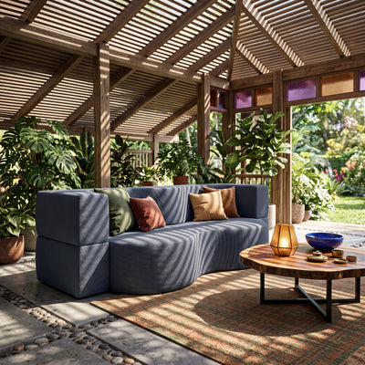 Kamelia Outdoor Foam Sofa Bed in Modern Style with Organic Form in Harris Outdoor Fabric – in a room setting